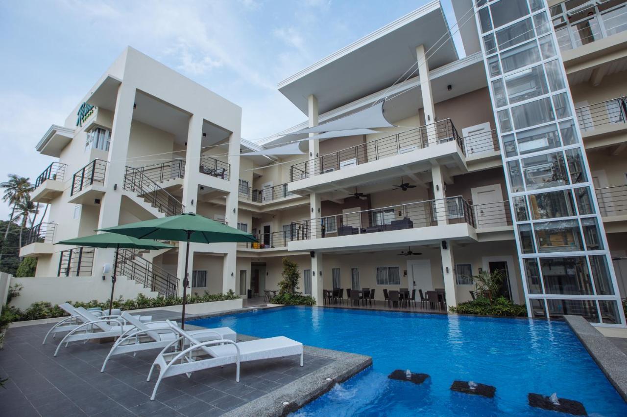 Rovira Suites Dumaguete City Экстерьер фото